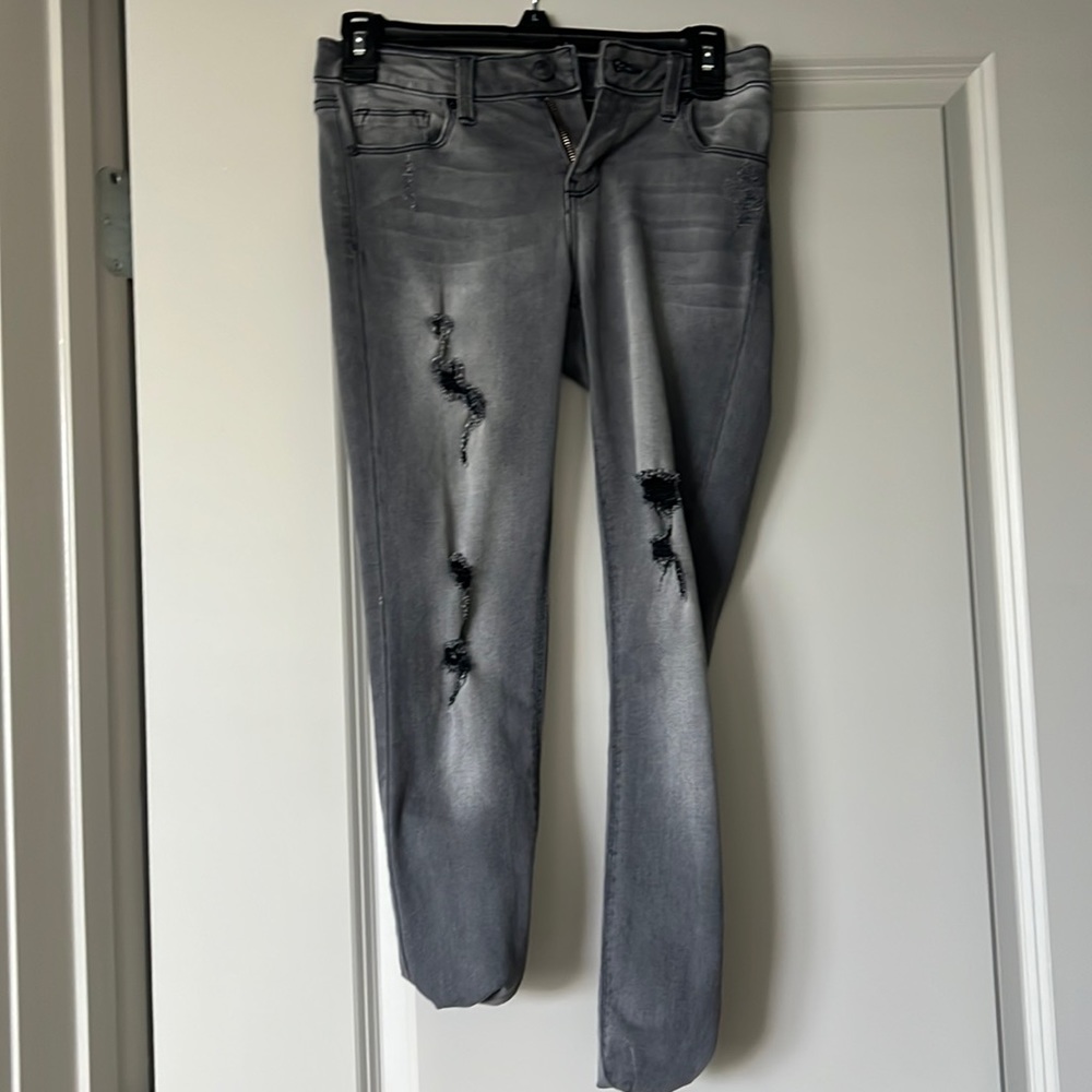 Gray/black distressed jeans